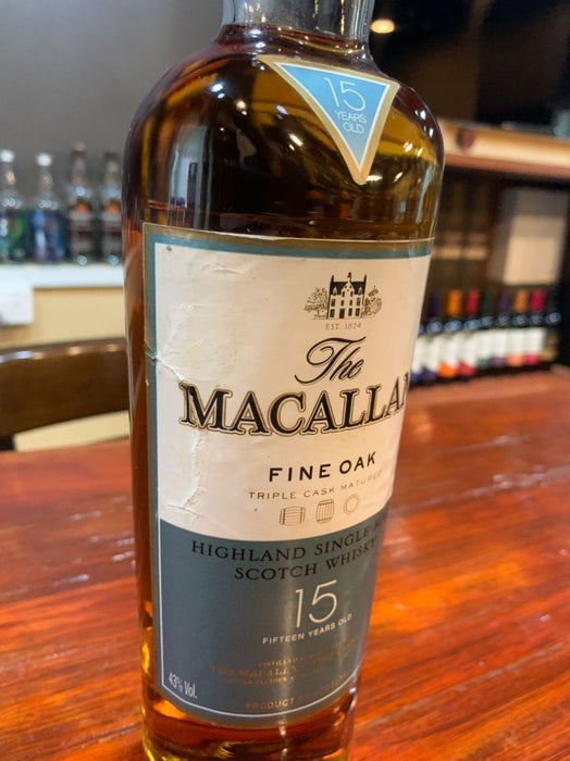 (Clearance) The Macallan 15 Year Old Fine Oak Highland Single Malt Scotch Whisky ABV 40% 70cl ((Condition: Discontinued (No Box). Label shows heavy wear/tarnish. Fragile Cork: Please open with extreme care as it may break.)