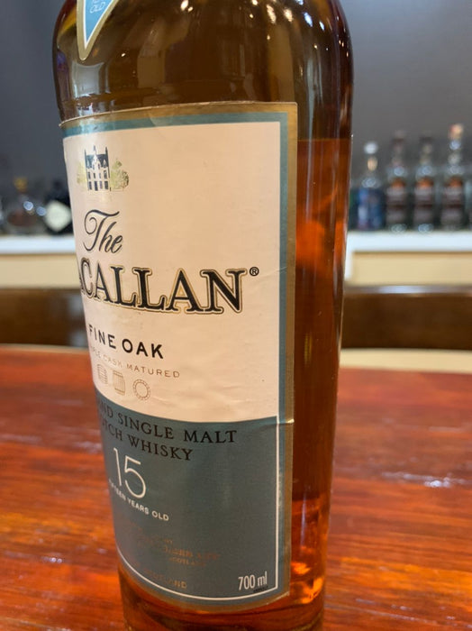 (Clearance) The Macallan 15 Year Old Fine Oak Highland Single Malt Scotch Whisky ABV 40% 70cl ((Condition: Discontinued (No Box). Label shows heavy wear/tarnish. Fragile Cork: Please open with extreme care as it may break.)