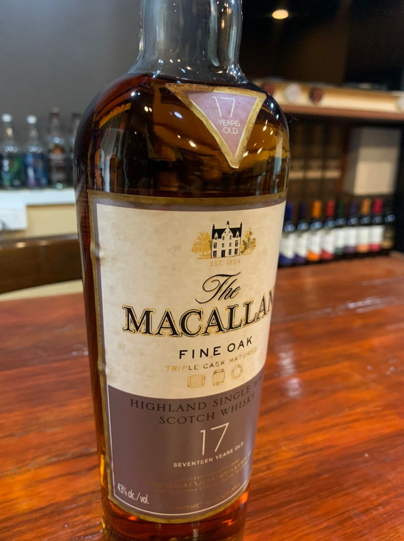 (Clearance) The Macallan 17 Year Old Fine Oak Highland Single Malt Scotch Whisky ABV 40% 70cl (Condition: Discontinued (No Box). Label shows heavy wear/tarnish. Fragile Cork: Please open with extreme care as it may break.)